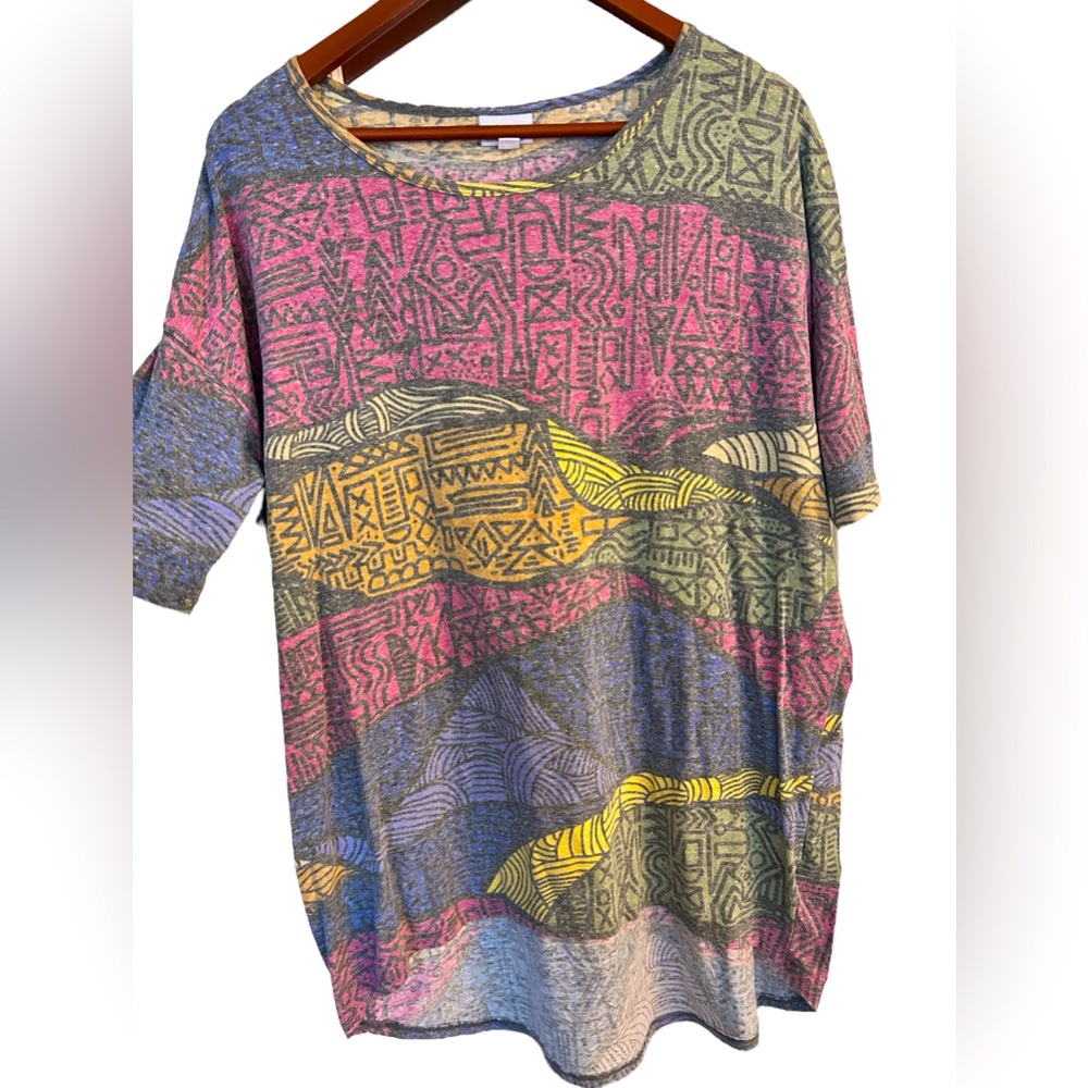 LulaRoe Irma- light washed multicolored Patterned top